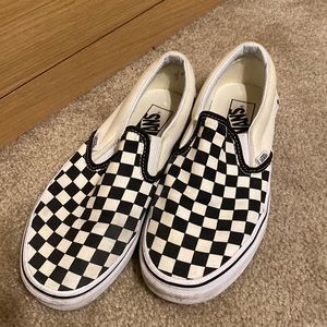 Vans - checkered slip ons.